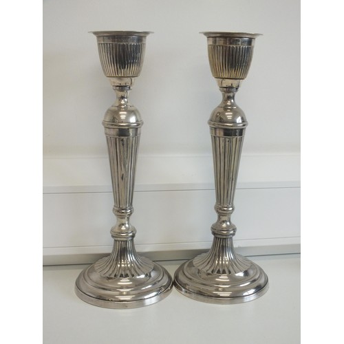 44 - PAIR OF LARGE SILVER PLATED CANDLESTICKS WITH WEIGHTED BASES APPROXIMATEL HEIGHT 36cms