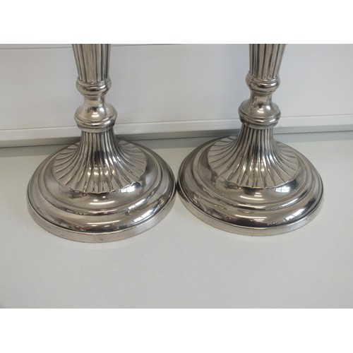 44 - PAIR OF LARGE SILVER PLATED CANDLESTICKS WITH WEIGHTED BASES APPROXIMATEL HEIGHT 36cms