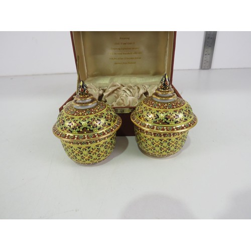 215 - PAIR OF BOXED THAILAND BENJARONG DECORATIVE 18 & 12K GILT HAND PAINTED LIDDED POTS