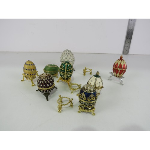 217 - 8 x ENAMEL EGG SHAPED TRINKET BOXES INCLUDES STANDS