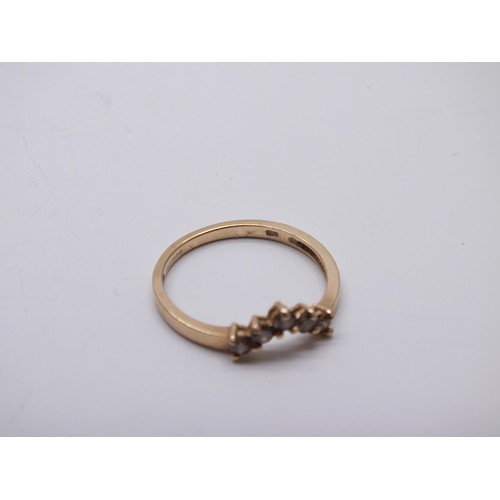 192 - 9ct GOLD WISHBONE RING WITH FIVE CITRINES SIZE N
Weight 1.4g