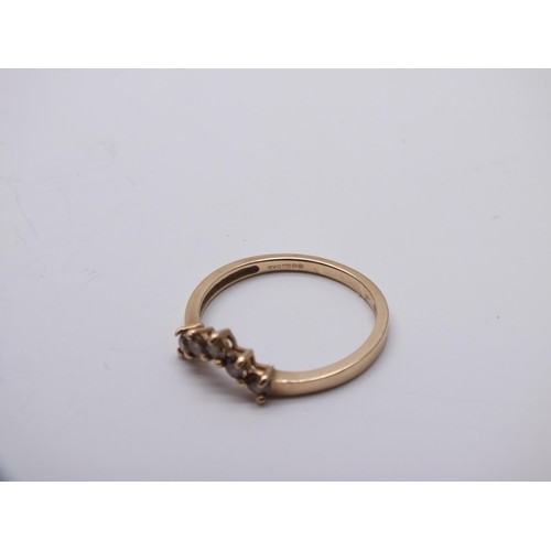 192 - 9ct GOLD WISHBONE RING WITH FIVE CITRINES SIZE N
Weight 1.4g