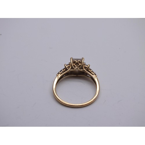 193 - 9ct GOLD RING CZ STONES SIZE O 1/2
Weight 2.8g