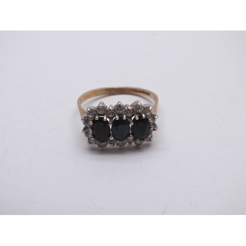 198 - GOLD RING WITH THREE SAPPHIRES & CZ SIZE M
 Weight 2.6g