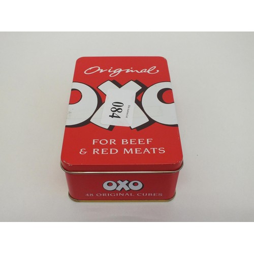 84 - OXO TIN FULL OF JEWELLERY & COINS