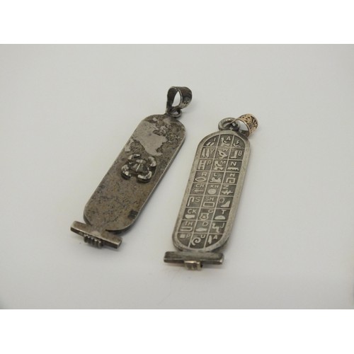 86 - TWO STERLING SILVER EGYPTIAN HIEROGLYPHIC CARTOUCHE PENDANTS & SILVER RUBY SET PENDANT NECKLACE