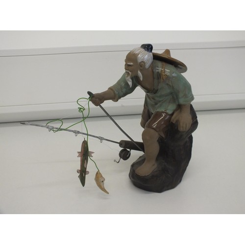 97 - CHINESE FISHERMAN SHIWAN CLAY MUDMAN FIGURINE WITH FISHING ROD & FISH