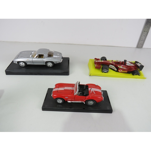 555 - SELECTION OF DIECAST INCLUDING FRICTION POWERED FORMULA RACE CAR ETC