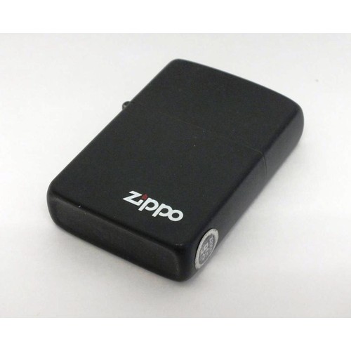 47 - VINTAGE MATTE BLACK ZIPPO LIGHTER WITH ORIGINAL PRICE STICKER