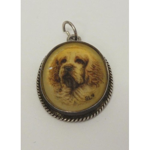 57 - VINTAGE SILVER HALLMARKED PENDANT WITH HAND PAINTED PORCELAIN ST BERNARD DOG CAMEO