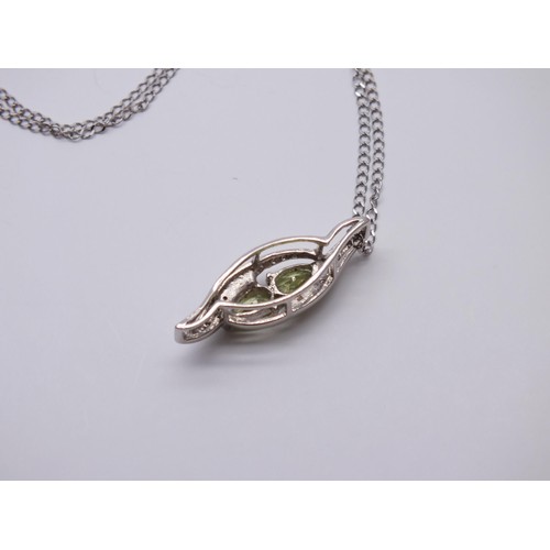 148D - 9ct WHITE GOLD PERIDOT PENDANT 16