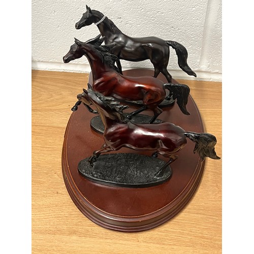 135 - SET OF 3 BRONZE HORSES ON WOODEN PLINTH 