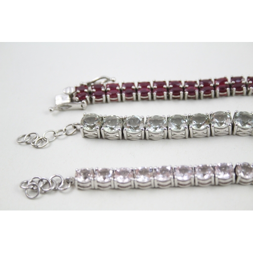 7 - Three silver gemstone tennis bracelets including Topaz