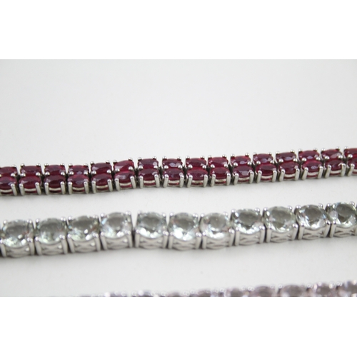 7 - Three silver gemstone tennis bracelets including Topaz