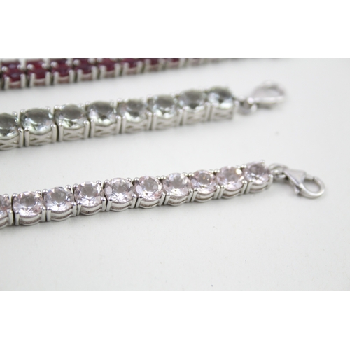 7 - Three silver gemstone tennis bracelets including Topaz