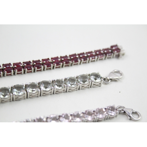 7 - Three silver gemstone tennis bracelets including Topaz