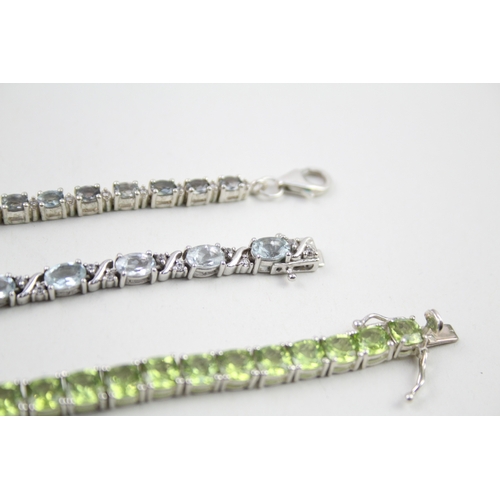 12 - Three silver gemstone tennis bracelets including Peridot