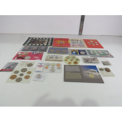 182 - COIN SETS INCLUDING COMMEMORATIVE MEDALS