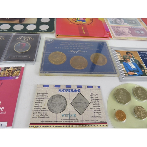 182 - COIN SETS INCLUDING COMMEMORATIVE MEDALS