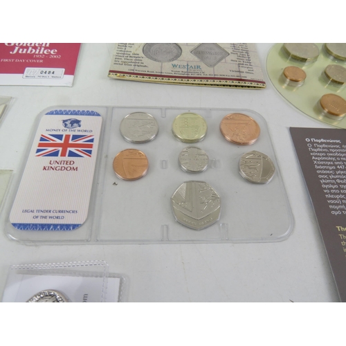 182 - COIN SETS INCLUDING COMMEMORATIVE MEDALS