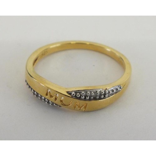 32 - STERLING SILVER GILT DIAMOND MUM RING