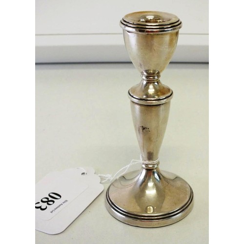 83 - STERLING SILVER CANDLESTICK Height 12cms, Birmingham hallmarks 1971, weighted base 111g