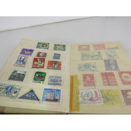 173 - WORLD STAMPS IN A SMALL STOCKBOOK AND VARIOUS PACKETS OF STAMPS