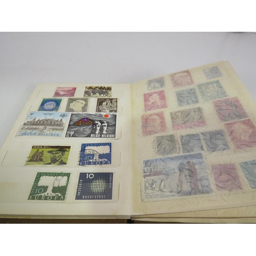 173 - WORLD STAMPS IN A SMALL STOCKBOOK AND VARIOUS PACKETS OF STAMPS