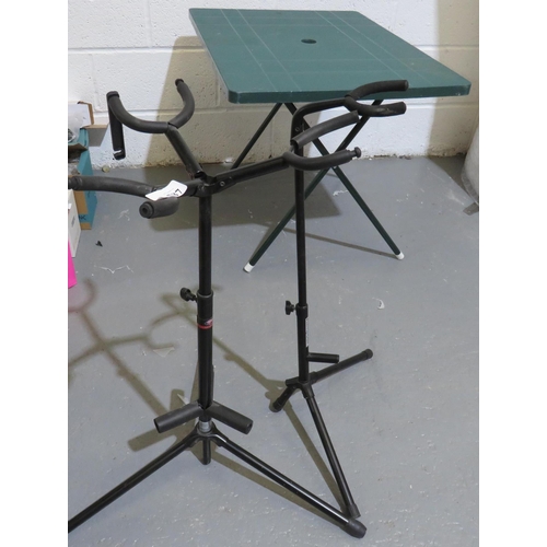 587 - A PAIR OF GUITAR STANDS - SINGLE HOLDER AND TREBLE HOLDER