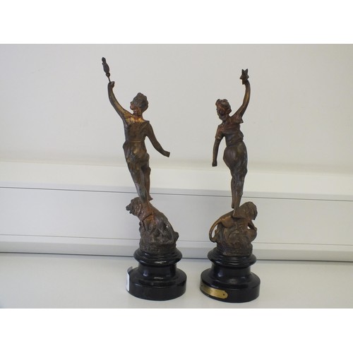 99 - PAIR OF METAL FIGURAL SCULPTURES