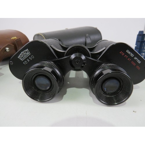 180 - CARL ZEISS 8 x 30 BINOCULARS AND PRINZ 10 x 50 BINOCULARS