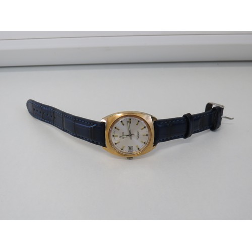 131 - OLD SHOP STOCK MONTIME AUTO WATCH IN WORKING ORDER