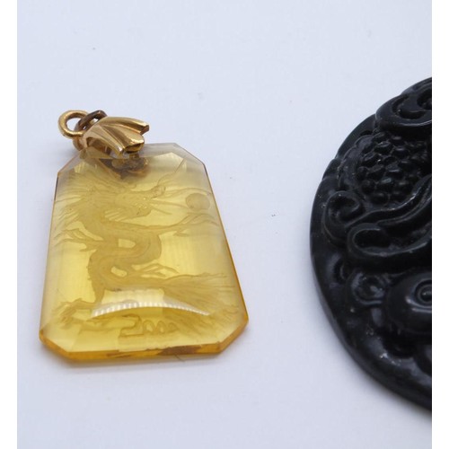 70 - CHINESE CARVED BLACK GREEN JADE PENDANT, CARVED JADE ANIMAL & AMBER GLASS CARVED CHINESE DRAGON PEND... 