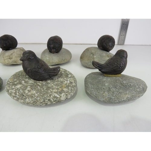 438 - CAST IRON BIRDS AND HEDGEHOGS ON PEBBLES