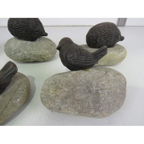 439 - CAST IRON BIRDS AND HEDGEHOGS ON PEBBLES