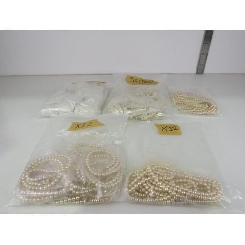 387 - FIVE BAGS OF FAUX PEARL NECKLACES