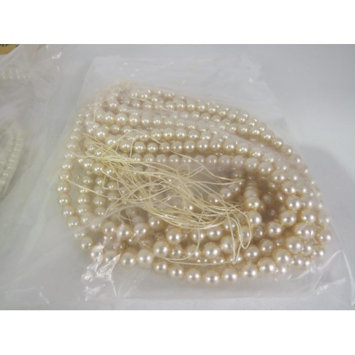 387 - FIVE BAGS OF FAUX PEARL NECKLACES