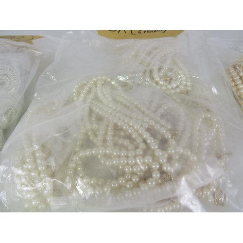 387 - FIVE BAGS OF FAUX PEARL NECKLACES