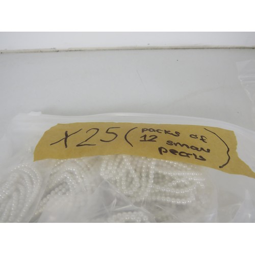 387 - FIVE BAGS OF FAUX PEARL NECKLACES