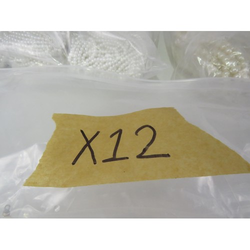 387 - FIVE BAGS OF FAUX PEARL NECKLACES