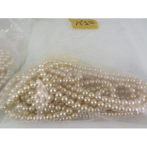 387 - FIVE BAGS OF FAUX PEARL NECKLACES