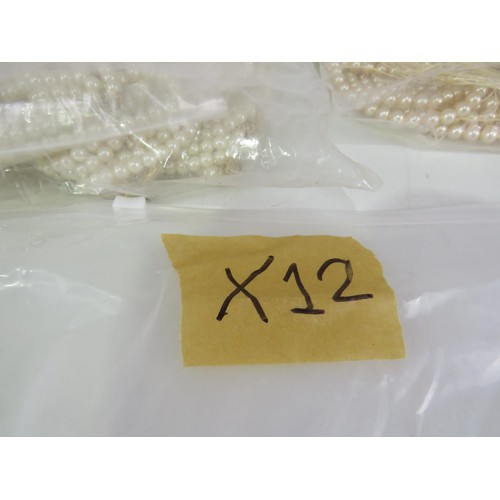 387 - FIVE BAGS OF FAUX PEARL NECKLACES