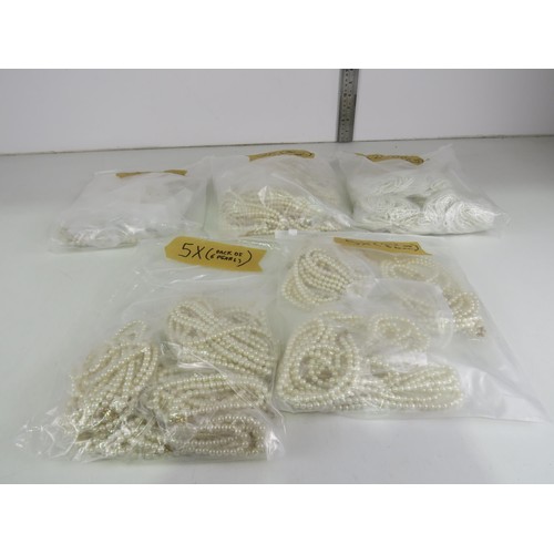 388 - FIVE BAGS OF FAUX PEARL NECKLACES