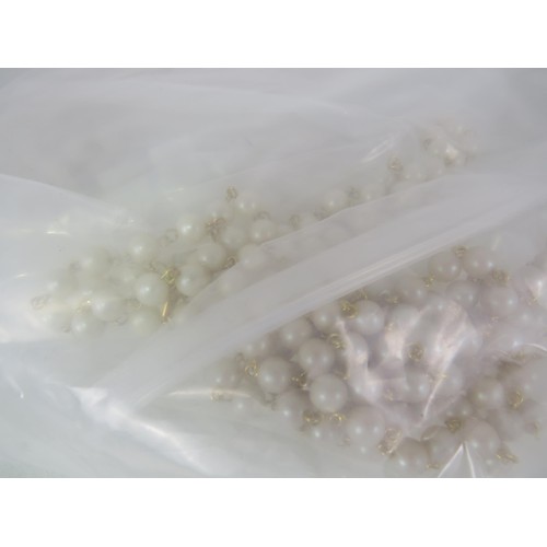 388 - FIVE BAGS OF FAUX PEARL NECKLACES