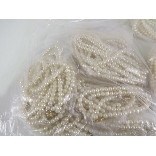 388 - FIVE BAGS OF FAUX PEARL NECKLACES