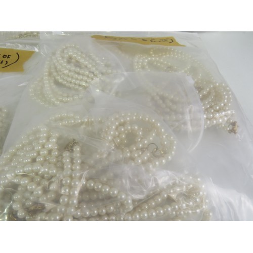 388 - FIVE BAGS OF FAUX PEARL NECKLACES