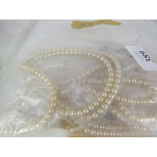 389 - FIVE BAGS OF FAUX PEARL NECKLACES