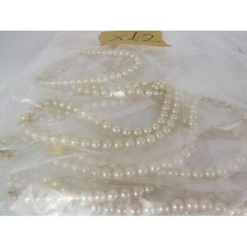 389 - FIVE BAGS OF FAUX PEARL NECKLACES