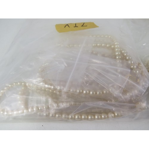 389 - FIVE BAGS OF FAUX PEARL NECKLACES