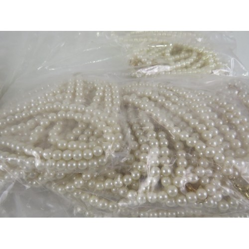 389 - FIVE BAGS OF FAUX PEARL NECKLACES